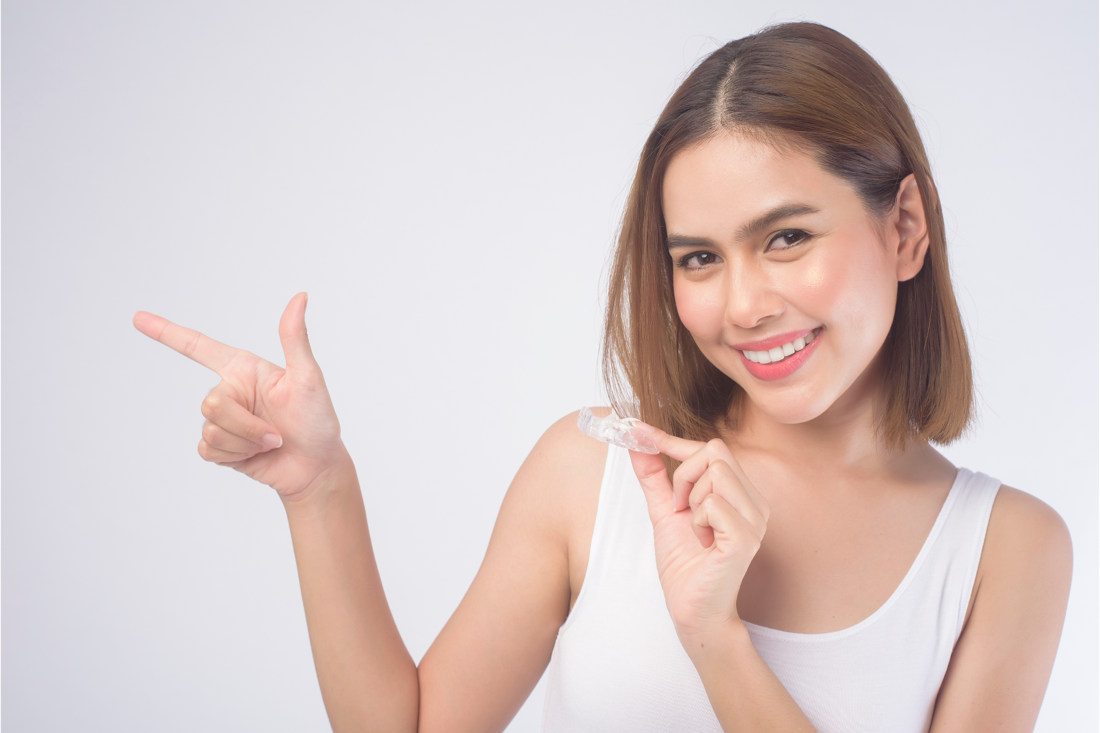 Invisalign in womans hand